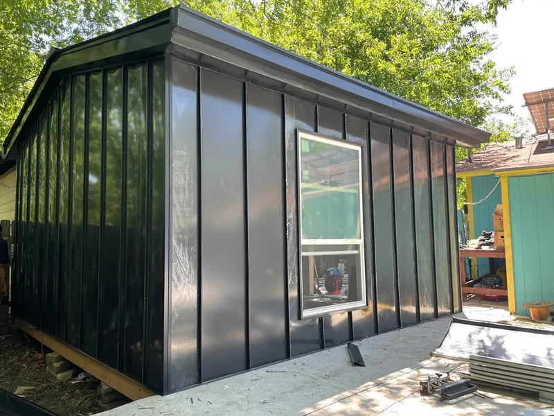 Black standing seam metal wall panels for Metal Roof Installation in Arnold